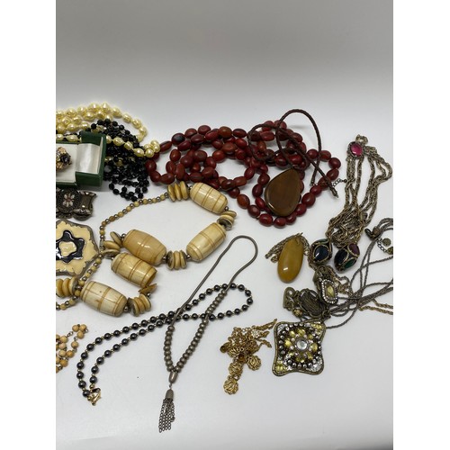 26 - Mixed costume Jewellery to include rings, brooches, badges, necklaces, vintage Talis wristwatch and ... 