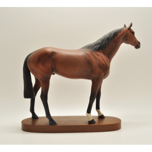 62 - Large Beswick Racehorse on wooden plinth 32cms height, stamped underneath.
Sale proceeds for this it... 