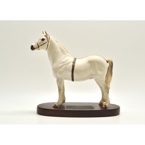 69 - Beswick horse Welsh Mountain Pony on wooden plinth, height 22.5cms
Sale proceeds for this item is be... 