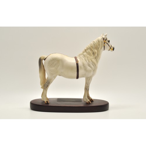 69 - Beswick horse Welsh Mountain Pony on wooden plinth, height 22.5cms
Sale proceeds for this item is be... 