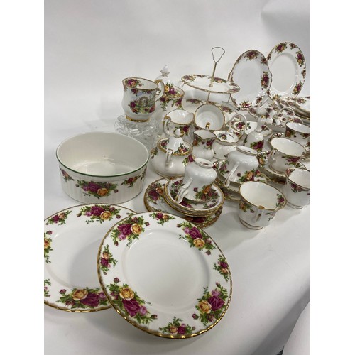 76 - A large quantity of Royal Albert Old Country Roses to include cake stand, teapot, milk jug, sugar bo... 