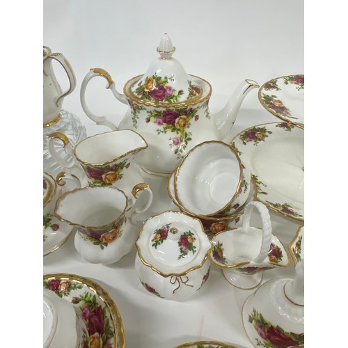 76 - A large quantity of Royal Albert Old Country Roses to include cake stand, teapot, milk jug, sugar bo... 