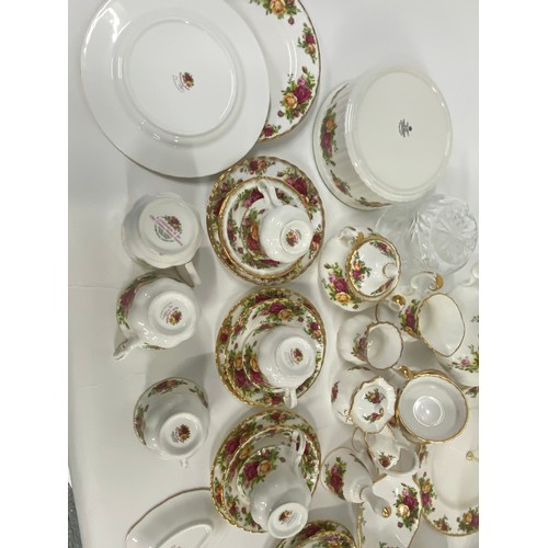 76 - A large quantity of Royal Albert Old Country Roses to include cake stand, teapot, milk jug, sugar bo... 