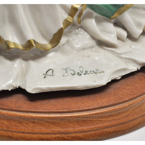 80 - A resin Capodimonte style figure of elegant lady reading to child, signed A. Belcari, approx H31cm