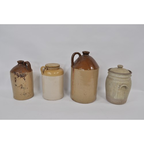 82 - Govancroft Pottery flagon with lid, together with 3 others