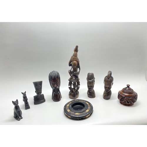 84 - African/Egyptian figures and treen predominately hand carved, also includes a Westair sphinx cat etc... 