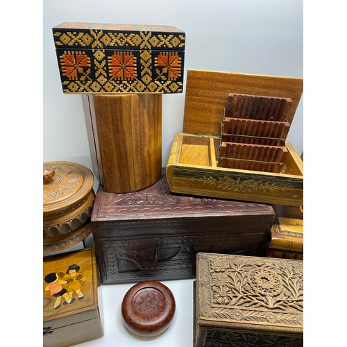 85 - An assortment of storage/jewellery/trinket/cigarette boxes and other items some hand carved, with ke... 