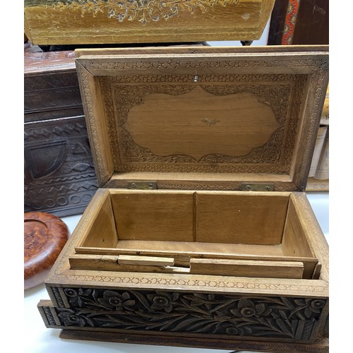 85 - An assortment of storage/jewellery/trinket/cigarette boxes and other items some hand carved, with ke... 