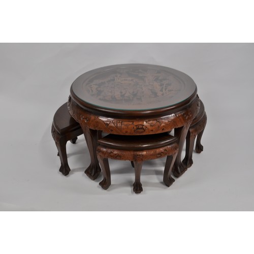 93 - Opium table complete with glass top, under the glass is a heavily 3D carved oriental scene, includes... 