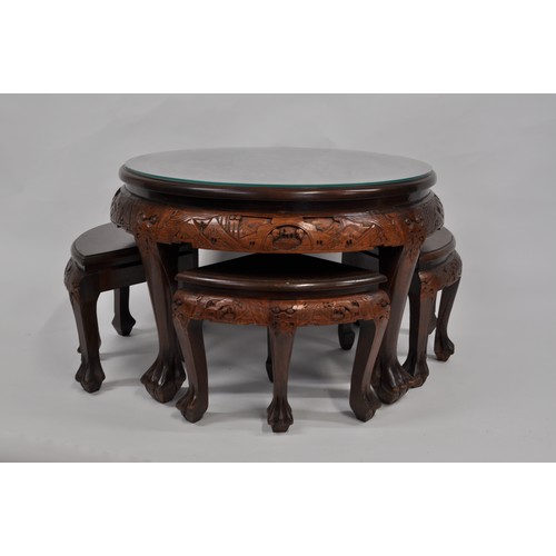 93 - Opium table complete with glass top, under the glass is a heavily 3D carved oriental scene, includes... 