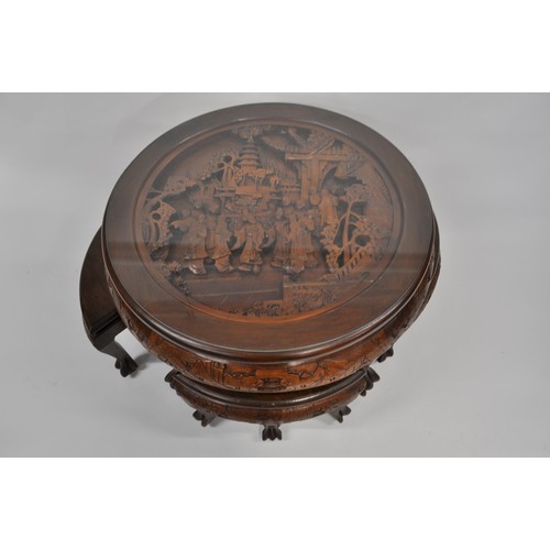 93 - Opium table complete with glass top, under the glass is a heavily 3D carved oriental scene, includes... 