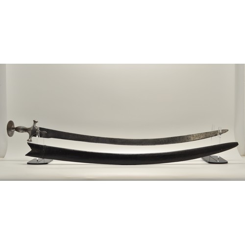 114 - Indo/Persian Tulwar sword/sabre with a traditional iron hilt, complete with scabbard.  Overall Lengt... 