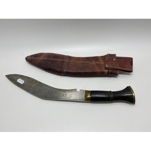 116 - Vintage Kukri in bespoke made leather sheath