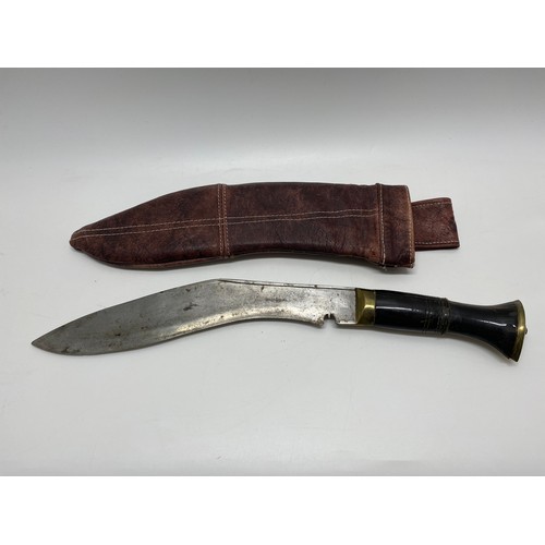 116 - Vintage Kukri in bespoke made leather sheath