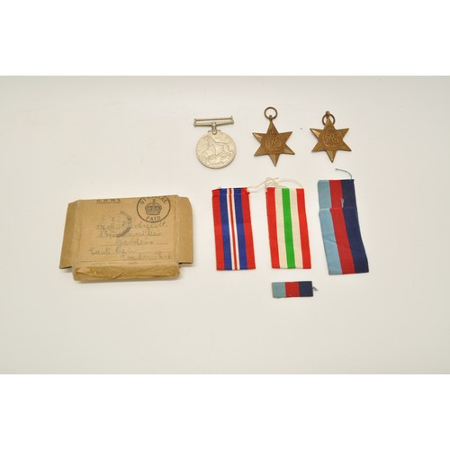 139 - WW2 medal group together with WW2 Seaman Torpedo Man badge and WW2 quarter gunners arm badge