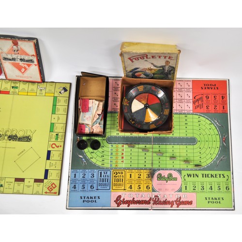 157 - A group of vintage and retro board games including; Poolette, Totalisator Greyhound Racing, etc.