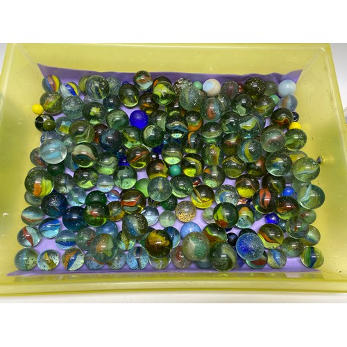 166 - A large quantity of mixed marbles in various sizes, some vintage, in played with condition