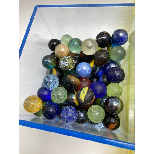 166 - A large quantity of mixed marbles in various sizes, some vintage, in played with condition