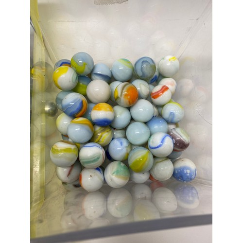 166 - A large quantity of mixed marbles in various sizes, some vintage, in played with condition