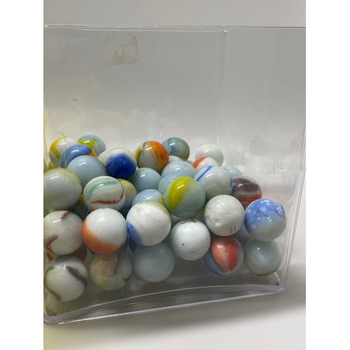 166 - A large quantity of mixed marbles in various sizes, some vintage, in played with condition