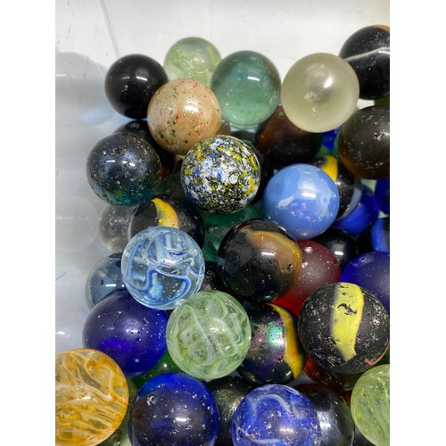 166 - A large quantity of mixed marbles in various sizes, some vintage, in played with condition