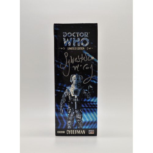 RARE DR WHO Signed Memorabilia - 40th anniversary Dr Who Cyberman Limited Edition boxed figure  with Certificate, which has x3 original DOCTORS signatures Sylvester McCoy, Peter Davidson, Colin Baker Dr no.6.
Provenance signed in Rooms Toystore in Upminster