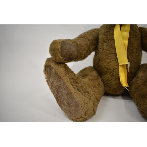 193 - Vintage jointed hump back teddy bear, approx overall length 53cm