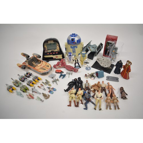 168 - Stars Wars Interest - A collection of Star Wars items to include pod racing figures, R2D2 micro mach... 