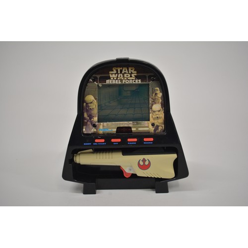 168 - Stars Wars Interest - A collection of Star Wars items to include pod racing figures, R2D2 micro mach... 