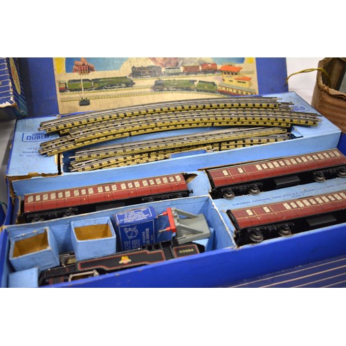 150 - Vintage Hornby Dublo electric train set complete with track, train, carriages and Hornby control uni... 