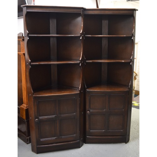 86 - Pair of Ercol corner cabinets with three open shelves above lower cupboard, approx H180cm