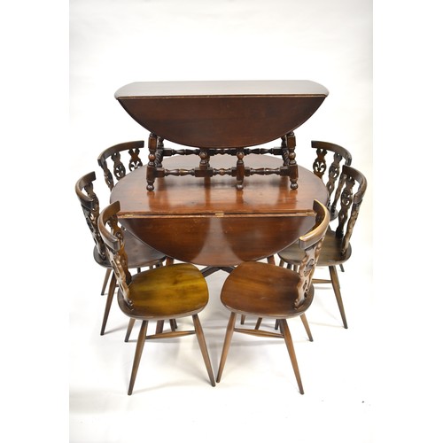 87 - Ercol furniture parcel consisting Drop leaf circular table with x6 fleur de lys chairs fleur, drople... 