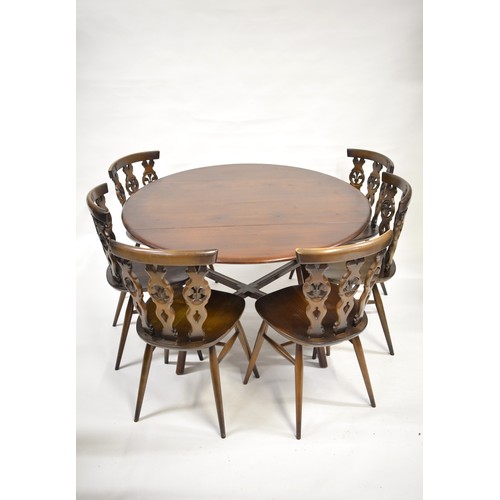 87 - Ercol furniture parcel consisting Drop leaf circular table with x6 fleur de lys chairs fleur, drople... 