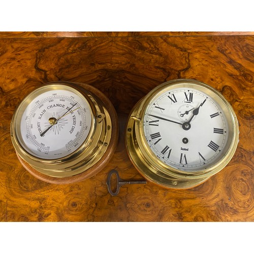 102 - Sestrel  ship's bulkhead brass wall clock with subsidiary dial, label to back reads 'Hudson Bay buil... 