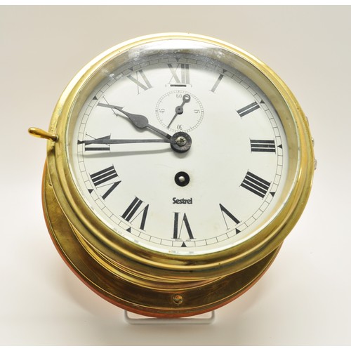 102 - Sestrel  ship's bulkhead brass wall clock with subsidiary dial, label to back reads 'Hudson Bay buil... 