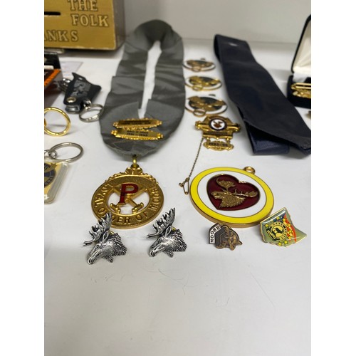 146 - Collection of Loyal Order of Moose memorabilia in wooden box, including car badge, medallions, trans... 