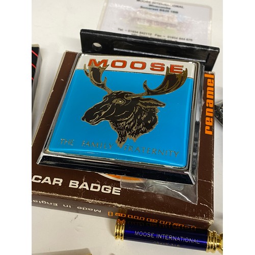 146 - Collection of Loyal Order of Moose memorabilia in wooden box, including car badge, medallions, trans... 