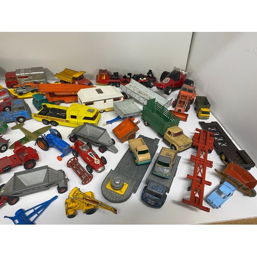 155A - In excess of 40 model vehicles and accessories including Corgi, Tonka and Lesney, in played with con... 