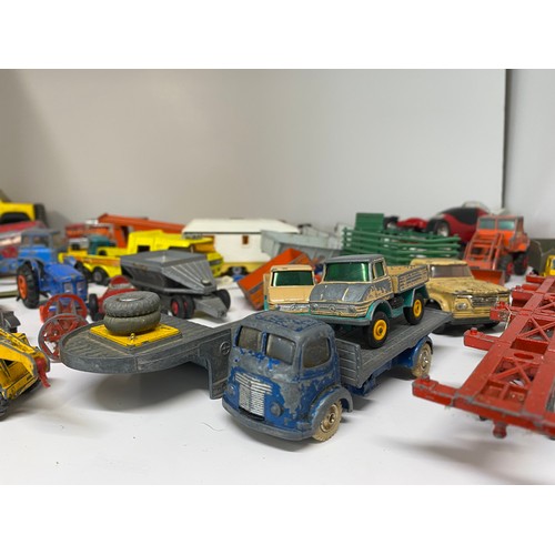 155A - In excess of 40 model vehicles and accessories including Corgi, Tonka and Lesney, in played with con... 