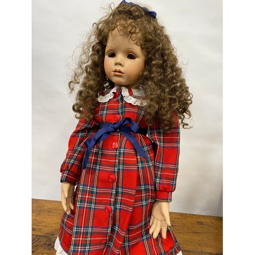 200 - Handmade doll in tartan attire, with porcelain face and limbs, removable curly locks, H74cm includin... 