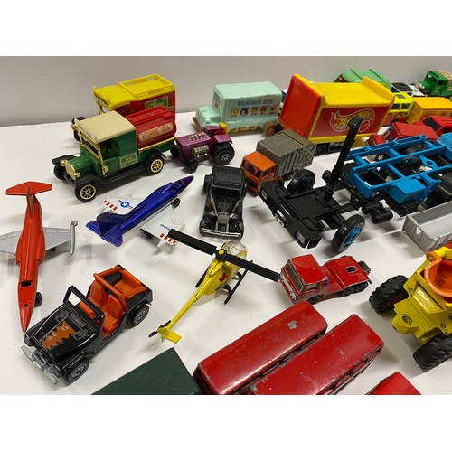 155C - A large quantity of diecast and other mixed cars and vehicles to include  Shell petrol pumps, Thomas... 