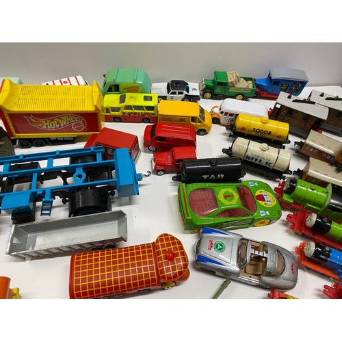 155C - A large quantity of diecast and other mixed cars and vehicles to include  Shell petrol pumps, Thomas... 