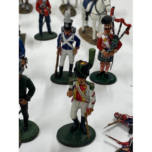 144A - A display cabinet full of military metal figures some Del Prado, predominantly Napoleonic Wars, some... 