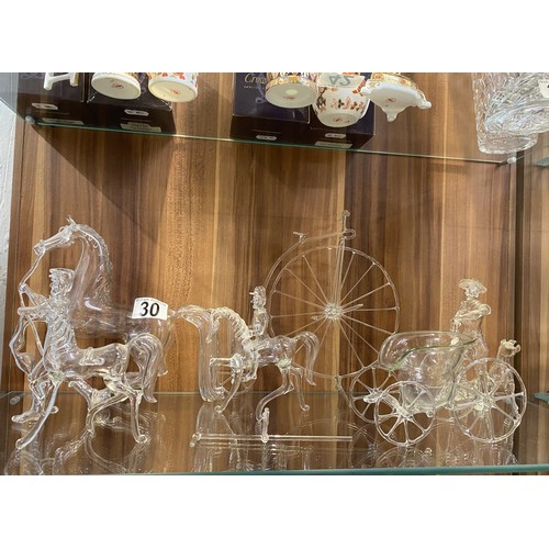 30 - A group of hand-blown glass items depicting horses, pennyfarthing, farmer with dog, with horse and c... 