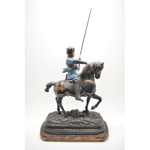 40 - Spelter figure of king/knight on horseback on wooden base, plaque reads 'Black Prince'