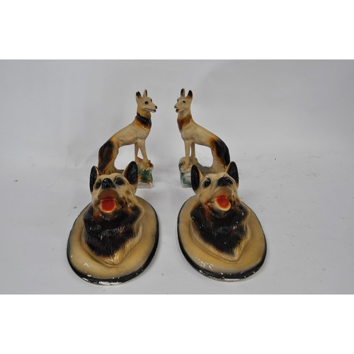 72 - A pair of painted chalkware wall plaques depicting Alsatian dogs together with pair of hand coloured... 