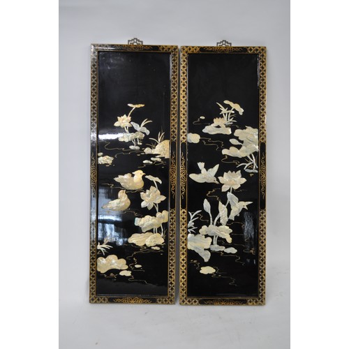 75 - Oriental black lacquered wall panels, reliefs depicting pond scenes. AF