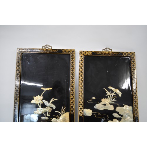 75 - Oriental black lacquered wall panels, reliefs depicting pond scenes. AF