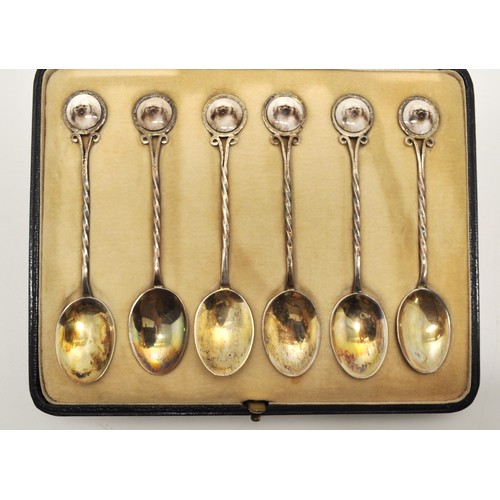 116 - Boxed set of x6 silver spoons with twisted handle design and enamel Pekingese dog finials, hallmarke... 