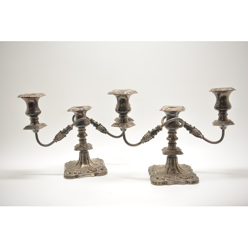 122 - Pair of silver candelabras in Victorian style, by Edward Viners, hallmarked Sheffield 1959, weighted... 